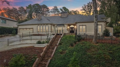 Tucked in Atlanta Country Clubs quiet interior, this refreshed on Atlanta Country Club in Georgia - for sale on GolfHomes.com, golf home, golf lot