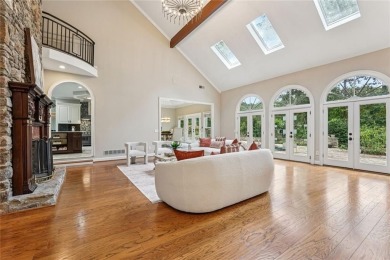 Tucked in Atlanta Country Clubs quiet interior, this refreshed on Atlanta Country Club in Georgia - for sale on GolfHomes.com, golf home, golf lot