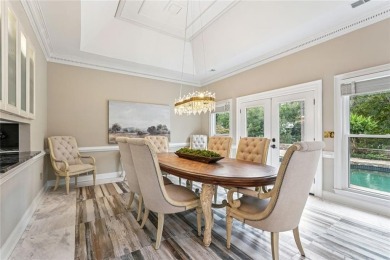 Tucked in Atlanta Country Clubs quiet interior, this refreshed on Atlanta Country Club in Georgia - for sale on GolfHomes.com, golf home, golf lot