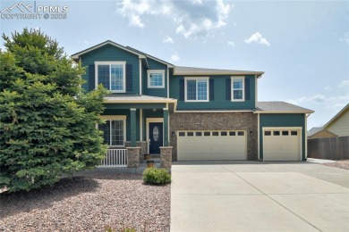 Welcoming home in a golf course community, situated on almost a on Antler Creek Golf Course in Colorado - for sale on GolfHomes.com, golf home, golf lot
