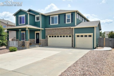 Welcoming home in a golf course community, situated on almost a on Antler Creek Golf Course in Colorado - for sale on GolfHomes.com, golf home, golf lot