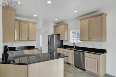 Welcoming home in a golf course community, situated on almost a on Antler Creek Golf Course in Colorado - for sale on GolfHomes.com, golf home, golf lot
