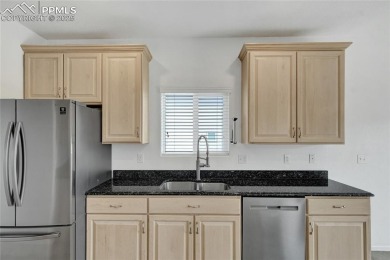 Welcoming home in a golf course community, situated on almost a on Antler Creek Golf Course in Colorado - for sale on GolfHomes.com, golf home, golf lot