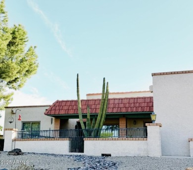 Fabulous mountain views on the side courtyard of this home on Rio Verde Country Club - Quail Run in Arizona - for sale on GolfHomes.com, golf home, golf lot