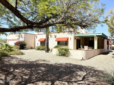 Fabulous mountain views on the side courtyard of this home on Rio Verde Country Club - Quail Run in Arizona - for sale on GolfHomes.com, golf home, golf lot
