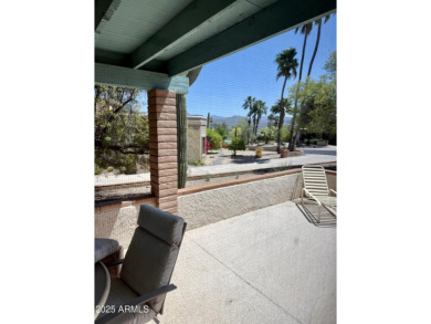 Fabulous mountain views on the side courtyard of this home on Rio Verde Country Club - Quail Run in Arizona - for sale on GolfHomes.com, golf home, golf lot