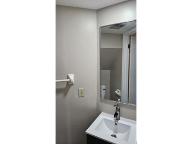 Renovated contemporary townhome with fun diagonal design on Hilaman Park Golf Course in Florida - for sale on GolfHomes.com, golf home, golf lot