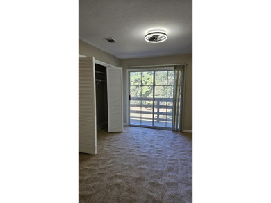 Renovated contemporary townhome with fun diagonal design on Hilaman Park Golf Course in Florida - for sale on GolfHomes.com, golf home, golf lot