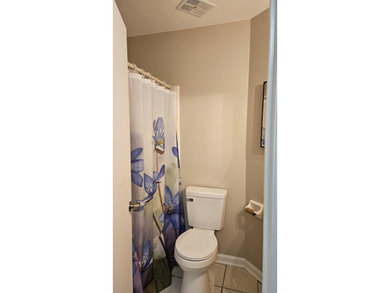 Renovated contemporary townhome with fun diagonal design on Hilaman Park Golf Course in Florida - for sale on GolfHomes.com, golf home, golf lot