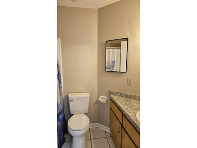 Renovated contemporary townhome with fun diagonal design on Hilaman Park Golf Course in Florida - for sale on GolfHomes.com, golf home, golf lot