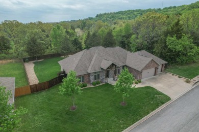 Welcome home to this  beautifully well kept home in the Payne on Payne Stewart Golf Club of Branson Hills - Front in Missouri - for sale on GolfHomes.com, golf home, golf lot