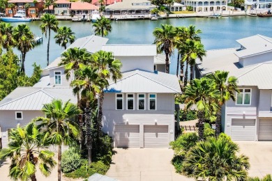 Canal-front luxury in a boutique gated setting. This Moorings on Palmilla Beach Golf Club in Texas - for sale on GolfHomes.com, golf home, golf lot