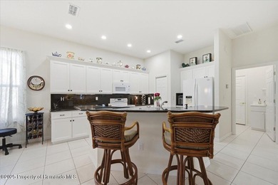 Located in Glen Lakes, this 1998 Addison Osprey home has been on Glen Lakes Country Club in Florida - for sale on GolfHomes.com, golf home, golf lot