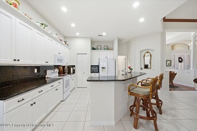 Located in Glen Lakes, this 1998 Addison Osprey home has been on Glen Lakes Country Club in Florida - for sale on GolfHomes.com, golf home, golf lot