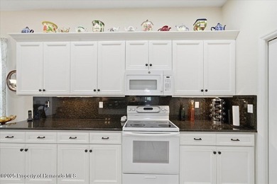 Located in Glen Lakes, this 1998 Addison Osprey home has been on Glen Lakes Country Club in Florida - for sale on GolfHomes.com, golf home, golf lot