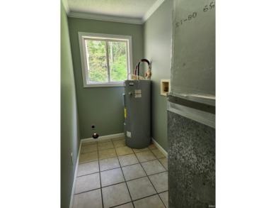Welcome home to this beautifully updated 3-bedroom, 2-bath ranch on French Lick Springs Golf Courses and Resort in Indiana - for sale on GolfHomes.com, golf home, golf lot
