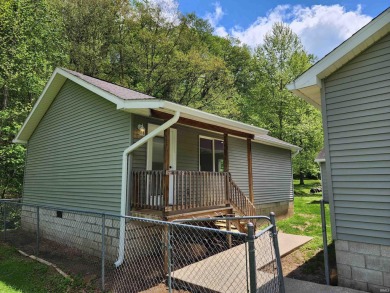Welcome home to this beautifully updated 3-bedroom, 2-bath ranch on French Lick Springs Golf Courses and Resort in Indiana - for sale on GolfHomes.com, golf home, golf lot