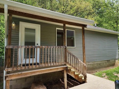 Welcome home to this beautifully updated 3-bedroom, 2-bath ranch on French Lick Springs Golf Courses and Resort in Indiana - for sale on GolfHomes.com, golf home, golf lot