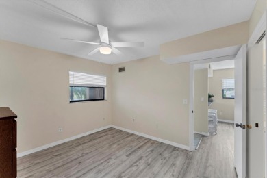 Step inside this beautiful END UNIT to be greeted by neutral on Capri Isle Golf Club in Florida - for sale on GolfHomes.com, golf home, golf lot