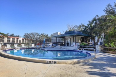Step inside this beautiful END UNIT to be greeted by neutral on Capri Isle Golf Club in Florida - for sale on GolfHomes.com, golf home, golf lot