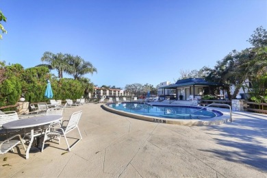 Step inside this beautiful END UNIT to be greeted by neutral on Capri Isle Golf Club in Florida - for sale on GolfHomes.com, golf home, golf lot
