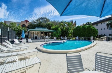 Step inside this beautiful END UNIT to be greeted by neutral on Capri Isle Golf Club in Florida - for sale on GolfHomes.com, golf home, golf lot