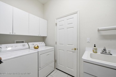 Located in Glen Lakes, this 1998 Addison Osprey home has been on Glen Lakes Country Club in Florida - for sale on GolfHomes.com, golf home, golf lot