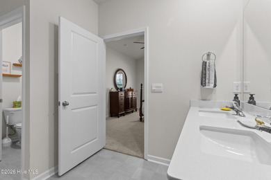 Nestled on a quiet cul-de-sac, this single-level four-bedroom on Harbour Point Golf Club in North Carolina - for sale on GolfHomes.com, golf home, golf lot