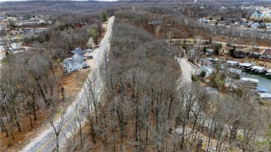 Rare opportunity to own a spacious double lot in an incredible on Seasons Ridge At Four Seasons in Missouri - for sale on GolfHomes.com, golf home, golf lot