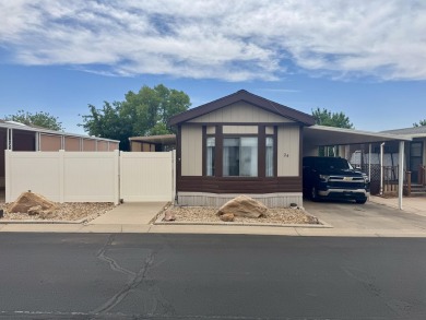 This immaculate 2-bedroom, 2-bath manufactured home is a rare on The Ledges Golf Club in Utah - for sale on GolfHomes.com, golf home, golf lot