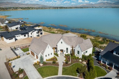 Experience an incredible lifestyle in this ultra-custom on Talons Cove Golf Club in Utah - for sale on GolfHomes.com, golf home, golf lot