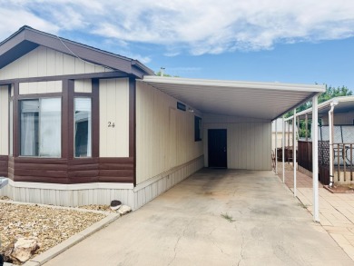 This immaculate 2-bedroom, 2-bath manufactured home is a rare on The Ledges Golf Club in Utah - for sale on GolfHomes.com, golf home, golf lot
