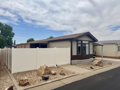 This immaculate 2-bedroom, 2-bath manufactured home is a rare on The Ledges Golf Club in Utah - for sale on GolfHomes.com, golf home, golf lot