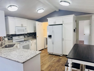 This immaculate 2-bedroom, 2-bath manufactured home is a rare on The Ledges Golf Club in Utah - for sale on GolfHomes.com, golf home, golf lot