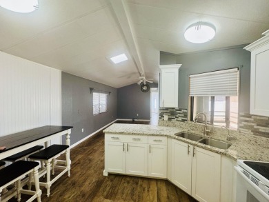 This immaculate 2-bedroom, 2-bath manufactured home is a rare on The Ledges Golf Club in Utah - for sale on GolfHomes.com, golf home, golf lot