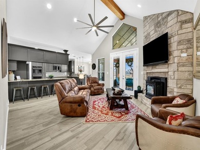 Exceptional home in Pecan Plantation featuring a private hangar on Pecan Plantation Country Club in Texas - for sale on GolfHomes.com, golf home, golf lot