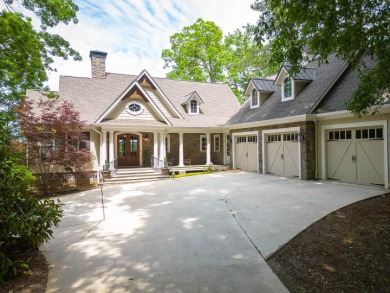 THIS CUSTOM HOME PERFECTLY DEFINES A DREAM LAKE HOUSE WITH AN on Reynolds Lake Oconee - Great Waters Course in Georgia - for sale on GolfHomes.com, golf home, golf lot