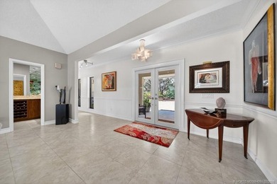 Located within the 24-hour manned, gated Evergreen Club, this on Evergreen Club in Florida - for sale on GolfHomes.com, golf home, golf lot