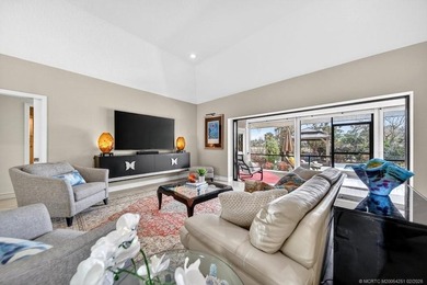 Located within the 24-hour manned, gated Evergreen Club, this on Evergreen Club in Florida - for sale on GolfHomes.com, golf home, golf lot