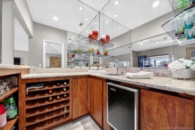 Located within the 24-hour manned, gated Evergreen Club, this on Evergreen Club in Florida - for sale on GolfHomes.com, golf home, golf lot