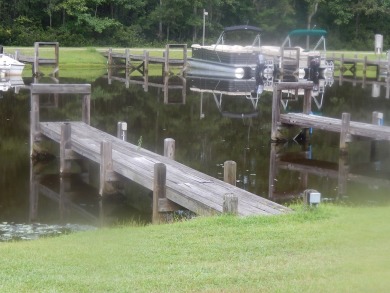 This nice golf course lot on Lake Arbu Drive backs up to the on Players Course At Wyboo Plantation in South Carolina - for sale on GolfHomes.com, golf home, golf lot