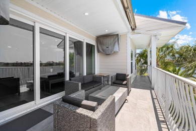 Turnkey Lakefront Home with Gulf Views | 6 Bed | 4.5 Bath | on Emerald Bay Golf Club in Florida - for sale on GolfHomes.com, golf home, golf lot