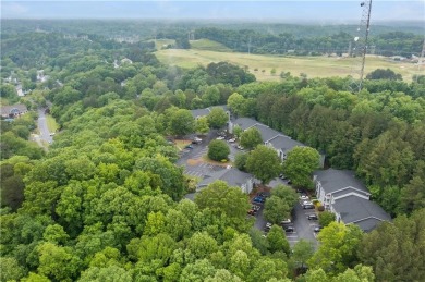 Perched in the esteemed City of Sandy Springs and centrally on Steel Canyon Golf Club in Georgia - for sale on GolfHomes.com, golf home, golf lot