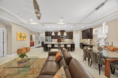 Impeccably Upgraded Piceno Model | 2BR + Den | Outdoor Oasis on Esplanade Golf and Country at Lakewood Ranch in Florida - for sale on GolfHomes.com, golf home, golf lot