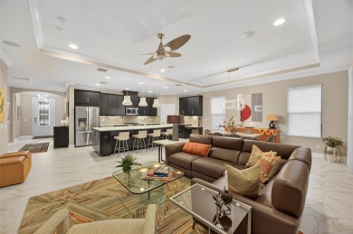 Impeccably Upgraded Piceno Model | 2BR + Den | Outdoor Oasis on Esplanade Golf and Country at Lakewood Ranch in Florida - for sale on GolfHomes.com, golf home, golf lot