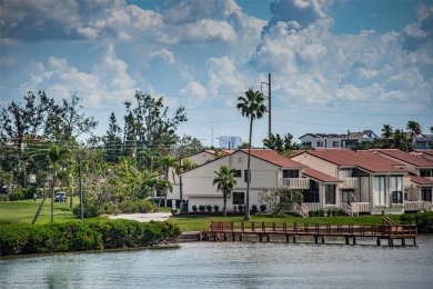Located in the walkable and charming island community of Isla on Isla Del Sol Yacht and Country Club in Florida - for sale on GolfHomes.com, golf home, golf lot