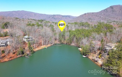 Discover a rare opportunity to craft your luxury lake retreat in on Rumbling Bald Resort on Lake Lure in North Carolina - for sale on GolfHomes.com, golf home, golf lot