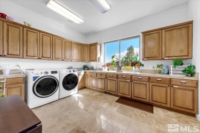 This luxurious custom-designed ArrowCreek estate sits on a 1 on ArrowCreek Golf Club - The Challenge in Nevada - for sale on GolfHomes.com, golf home, golf lot