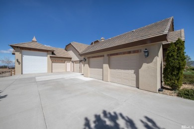 This luxurious custom-designed ArrowCreek estate sits on a 1 on ArrowCreek Golf Club - The Challenge in Nevada - for sale on GolfHomes.com, golf home, golf lot