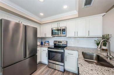 Located in the walkable and charming island community of Isla on Isla Del Sol Yacht and Country Club in Florida - for sale on GolfHomes.com, golf home, golf lot